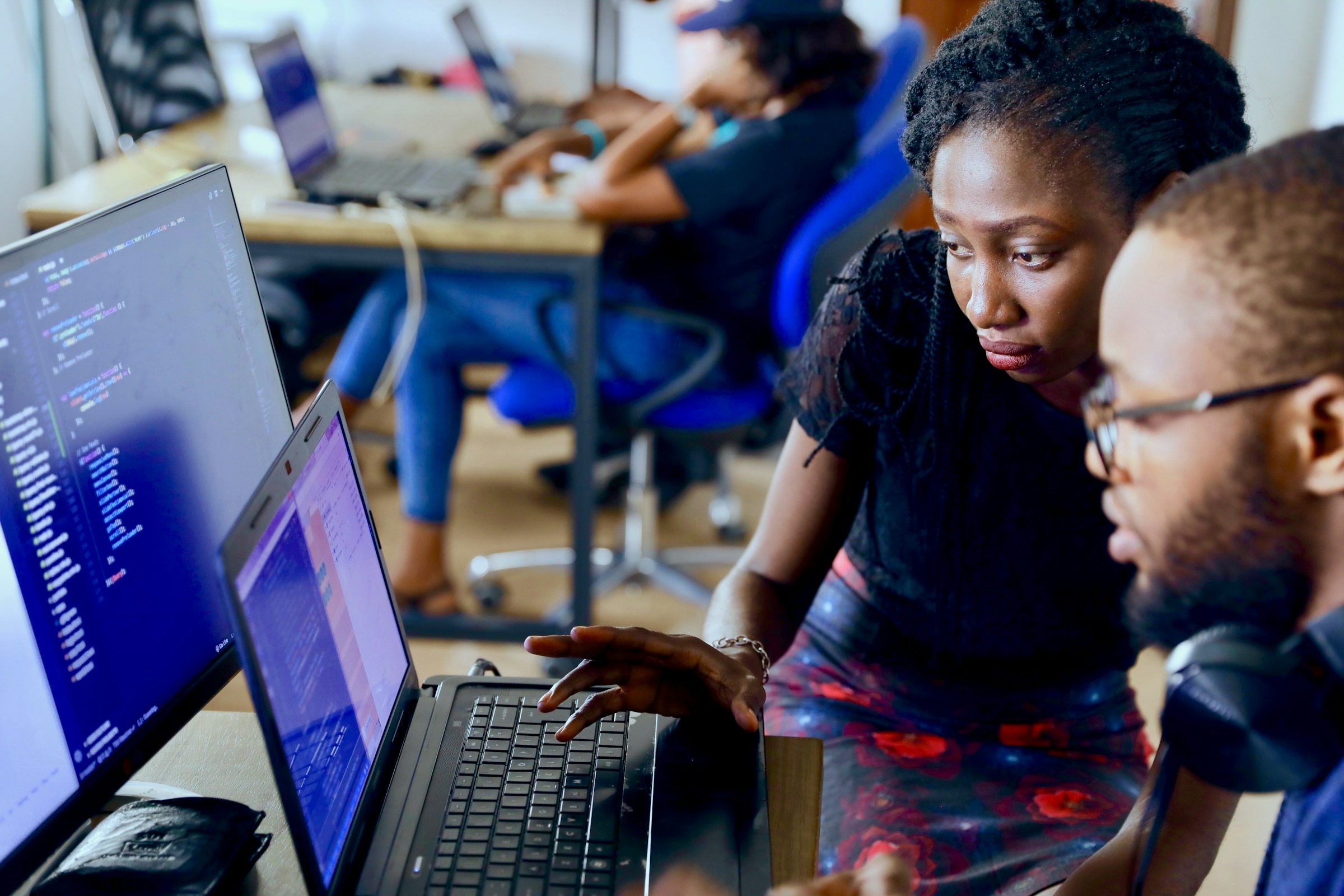 Student using a laptop while planning life in Senegal