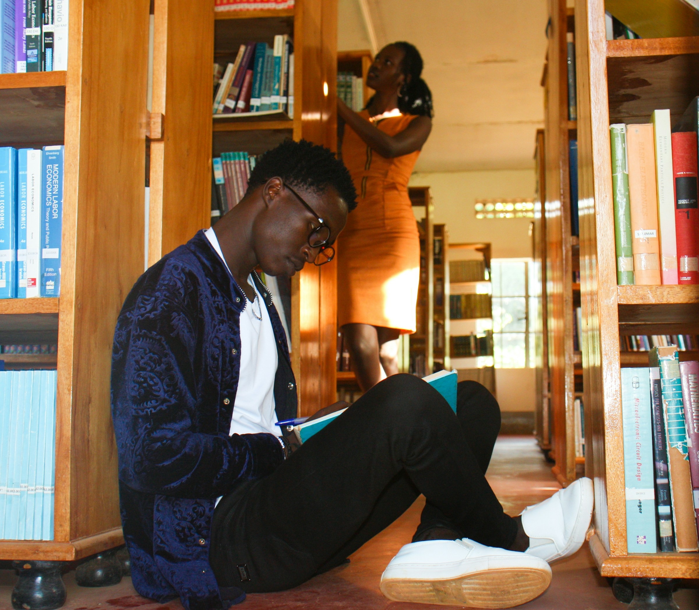 Student reading and studying outdoors